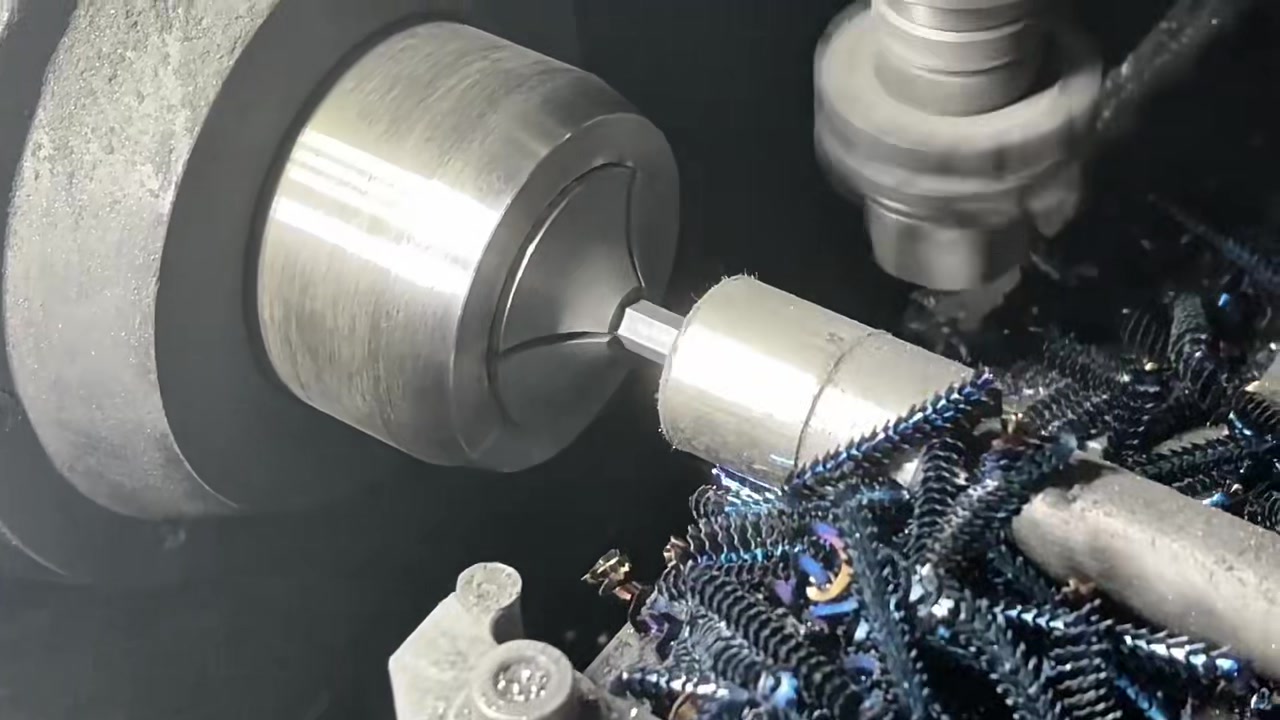CNC turning a socket blank with coolant and chip flow